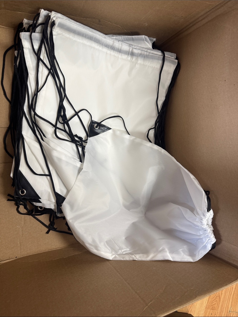 White Drawstring Backpack Bag with Black Cord Accents
